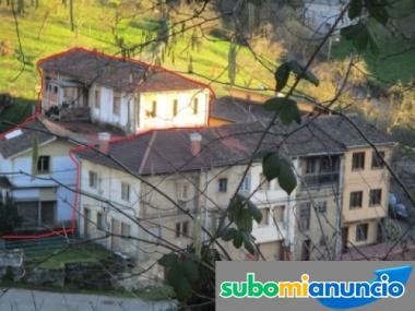 Vivienda+negocio en edificio m